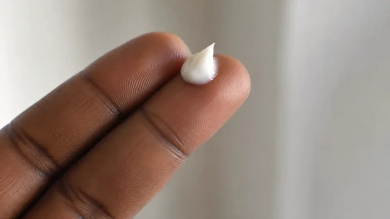 A small coin sized amount of cream on fingertips before application