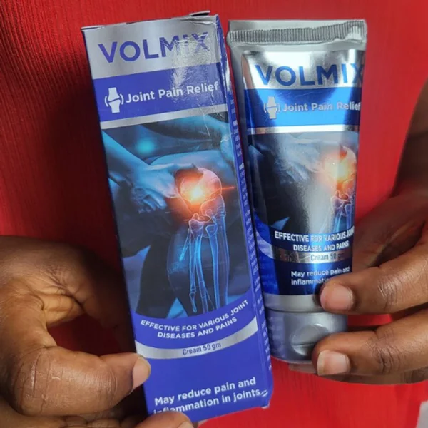 Close view of the Volmix box and tube held by a customer in Nigeria